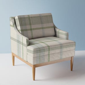 May include: A patterned armchair with a light wood frame. The upholstery features a plaid design in shades of green, blue, and beige. The chair has a cushioned seat, back, and armrests, and is supported by four tapered legs.