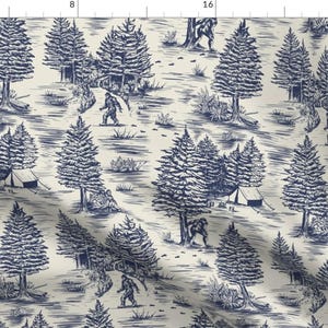 May include: A blue and white toile-style fabric pattern featuring a repeating design of trees, footprints, and a creature resembling Bigfoot. The pattern is reminiscent of a vintage illustration.