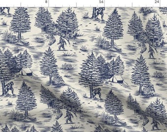 May include: A blue and white toile-style fabric pattern featuring a repeating design of trees, footprints, and a creature resembling Bigfoot. The pattern is reminiscent of a vintage illustration.