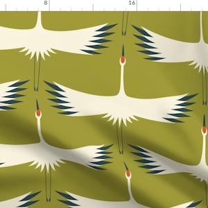 May include: A seamless pattern featuring white cranes with black and blue wing details on a green background. The cranes are stylized and have a geometric design.