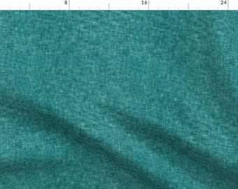 May include: Teal textured fabric with a subtle woven pattern. The fabric has a slightly rough texture and a soft, muted teal color.