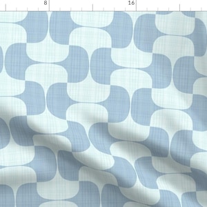 May include: A repeating pattern of blue and white curved shapes on a light blue background. The pattern is reminiscent of a retro design.