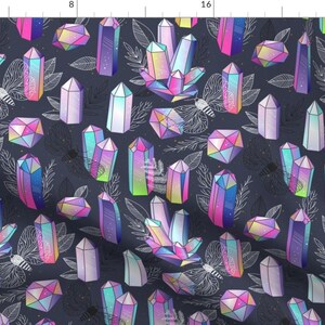 May include: A seamless pattern featuring iridescent crystals in various shapes and sizes on a dark blue background. The crystals are outlined in white and have a holographic effect. The pattern is repeated throughout the fabric.