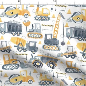 May include: A white background with a repeating pattern of yellow, gray, and orange construction vehicles. The vehicles include a cement mixer, a bulldozer, a dump truck, a crane, and a steamroller. The vehicles are painted in a watercolor style.
