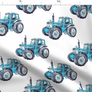 May include: A seamless pattern featuring a repeating design of blue watercolor tractors on a white background. The tractors are detailed with black wheels and white accents.