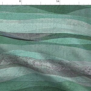 May include: Abstract digital art print featuring a pattern of wavy, horizontal stripes in shades of green and gray. The design resembles a landscape with rolling hills.