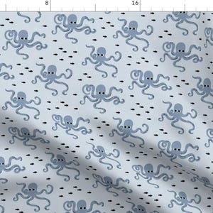 May include: Light blue fabric with a repeating pattern of gray octopuses and small black fish. The octopuses have large eyes and curled tentacles, creating a whimsical underwater theme. The fabric is suitable for various craft projects.