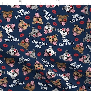 May include: A navy blue fabric with a repeating pattern of cartoon bulldogs with pink tongues and red lips. The bulldogs have different colored fur, including brown, white, and black. The text "100% Kiss a Bull" is repeated throughout the pattern.