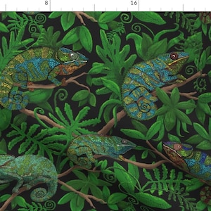 May include: A seamless pattern featuring green and blue chameleons on a black background. The chameleons are surrounded by green leaves and vines.