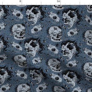 May include: A blue and white repeating pattern featuring a cartoon illustration of a skull with a fork sticking out of the top. The skull is surrounded by other smaller details, including worms, flies, and bones.