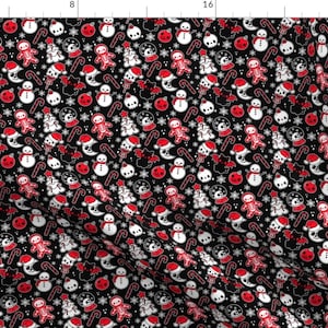 May include: A black fabric with a repeating pattern of white and red Christmas and Halloween icons. The icons include a snowman, a ghost, a skull, a candy cane, a gingerbread man, a Christmas tree, a pumpkin, and a crescent moon.