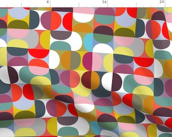 May include: A colorful geometric pattern with overlapping circles and semi-circles in shades of red, orange, yellow, green, blue, purple, pink, white, and gray.