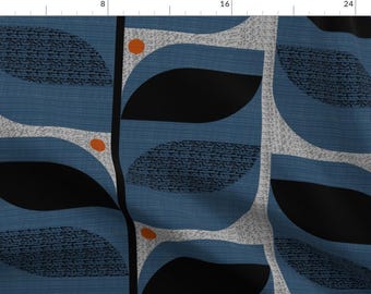 May include: Abstract geometric pattern fabric in shades of blue, black, and orange. The design features stylized leaves and circles.