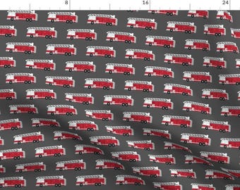 May include: A repeating pattern of red fire trucks on a dark gray background. The fire trucks have white ladders and black wheels.