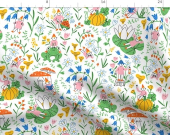 May include: A white background with a repeating pattern of colorful illustrations. The illustrations include mushrooms, gnomes, frogs, flowers, and pumpkins. The gnomes are wearing pink, blue, and yellow hats. The mushrooms are red and orange with white spots. The flowers are pink, blue, yellow, and white. The frogs are green with black eyes. The pumpkins are orange with green stems.