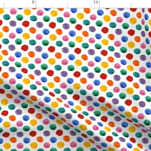 May include: A white background with a repeating pattern of colorful circles. The circles are in shades of red, orange, yellow, green, blue, purple, and pink.