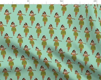 May include: A repeating pattern of hula dancers on a light blue background. Each dancer is wearing a grass skirt and holding a flower lei. The dancers are all facing the right side of the image.