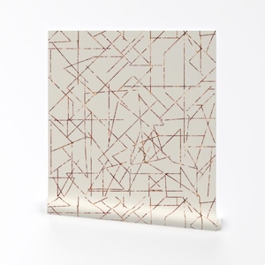 May include: A beige wallpaper with a geometric pattern of thin, copper-colored lines forming triangles and squares.
