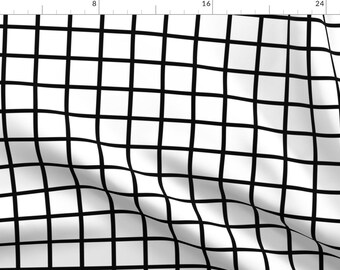 May include: Black and white checkered pattern fabric. The fabric is folded and has a grid pattern with black lines on a white background.