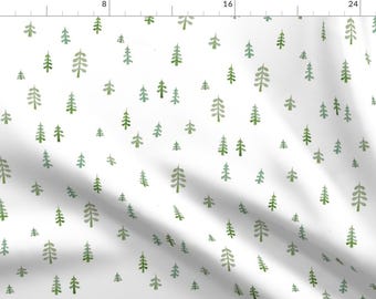 May include: A white fabric with a repeating pattern of green and grey stylised trees. The trees are different sizes and are scattered randomly across the fabric.