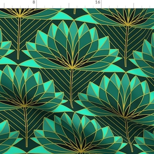 May include: A repeating pattern of stylized lotus flowers in shades of teal and green, outlined in gold against a dark teal background. The design has an Art Deco feel, with geometric shapes and lines.