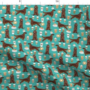 May include: A teal blue background with a repeating pattern of brown Irish Setter dogs and coffee cups. The dogs are in various poses, some are sitting, some are standing, and some are walking. The coffee cups are filled with coffee and have a brown lid. There are also some coffee beans scattered around.