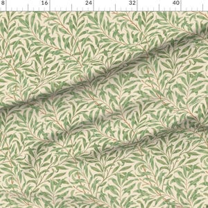 May include: A seamless pattern featuring a repeating design of green willow branches with leaves on a cream background.