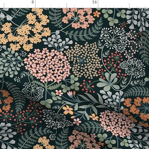 May include: A dark green fabric with a floral pattern featuring pink, orange, and yellow flowers. The flowers are surrounded by green leaves and stems.
