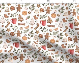 May include: A white background with a repeating pattern of gingerbread men, houses, candy canes, cinnamon sticks, holly, stars, and mugs of hot chocolate. The pattern is in shades of brown, red, and green.