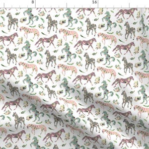 May include: A white background with a repeating pattern of floral horses in pink, gray, and teal. The horses are outlined in black and have a watercolor effect.