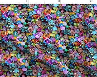 May include: A colorful fabric with a repeating pattern of various shapes and designs. The shapes are mostly round and oval, and they are filled with a variety of colors, including blue, green, purple, pink, red, and yellow. The designs are intricate and detailed, and they include flowers, butterflies, and other abstract patterns.