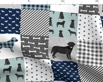 May include: A patchwork fabric design featuring black labrador silhouettes, bone patterns, paw prints, and blue and gray plaid patterns.
