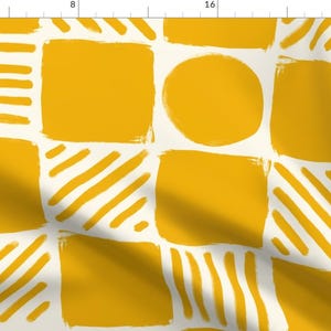 May include: A seamless pattern featuring a repeating design of yellow squares, circles, and diagonal lines on a white background.