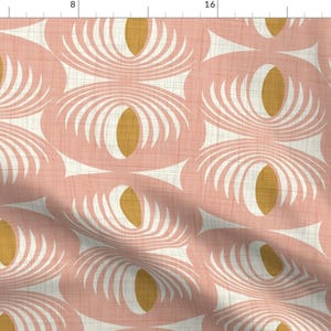May include: A seamless pattern featuring a repeating design of overlapping circles with white and gold accents on a pink background.