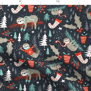 May include: A dark blue fabric with a repeating pattern of sloths wearing Christmas jumpers and hats, along with Christmas trees, holly, and candy canes.