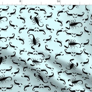 May include: A seamless pattern featuring black scorpion silhouettes on a light blue background. The scorpions are arranged in a repeating pattern, creating a unique and stylish design.