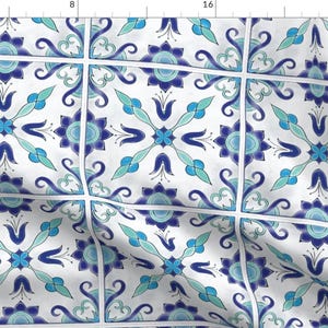 May include: A seamless pattern of blue and white tiles with a floral design. The tiles are arranged in a grid pattern and have a white background with blue and green floral motifs.