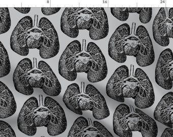 May include: A seamless pattern featuring a black and white anatomical illustration of human lungs and heart on a light gray background.