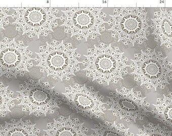 May include: A seamless pattern featuring intricate white lace-like mandalas on a light gray background. The mandalas have a delicate, intricate design with a central circle and radiating patterns.