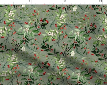 May include: A green fabric with a repeating pattern of white berries, red berries, and green leaves. The fabric has a linen texture.