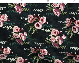 May include: A dark green fabric with a repeating pattern of pink and red flowers and green leaves. The flowers are stylised and have a watercolour effect.