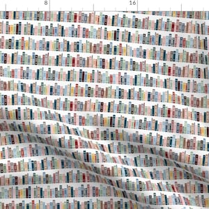 May include: A seamless pattern featuring a repeating design of colourful books on a white background. The books are arranged in rows and columns, creating a bookshelf effect. The books are in various shades of blue, green, red, yellow, and pink.