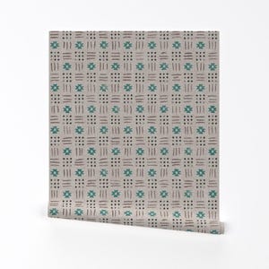 May include: A beige fabric with a repeating pattern of teal blue and brown geometric shapes. The pattern is reminiscent of a traditional woven textile.