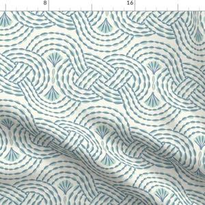 May include: A seamless pattern featuring a repeating design of blue and green curved lines and shapes on a white background.