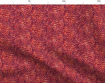 May include: A seamless pattern of red and purple scales. The scales are arranged in a wavy pattern, creating a textured look.