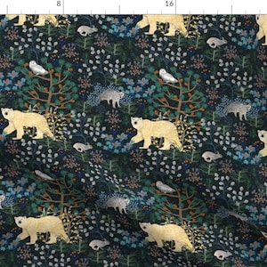 May include: A dark blue fabric with a repeating pattern of white polar bears, owls, and other woodland creatures. The pattern is set against a background of green, blue, and brown foliage.