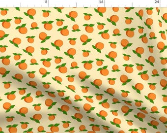 May include: A seamless pattern featuring a repeating design of orange fruit with green leaves on a light yellow background.