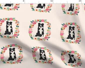 May include: A seamless pattern featuring black and white border collies sitting inside floral wreaths. The wreaths are made of pink, red, and green flowers. The background is a light beige color.