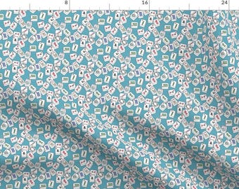May include: A seamless pattern featuring a repeating design of white mahjong tiles with various symbols and numbers on a light blue background.