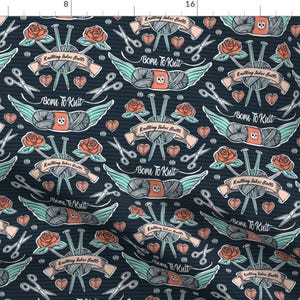 May include: A seamless pattern featuring a repeating design of knitting needles, yarn balls, and wings with the text "Born to Knit" and "Knitting Takes Balls". The pattern is on a dark blue background with pink, white, and teal accents.